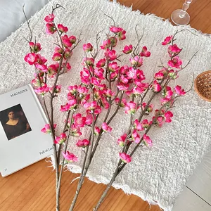 Three pieces of vibrant magenta artificial plum blossom branches for home decor