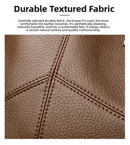 Close-up of durable brown lychee grain leather with precise stitching detail on tote bag