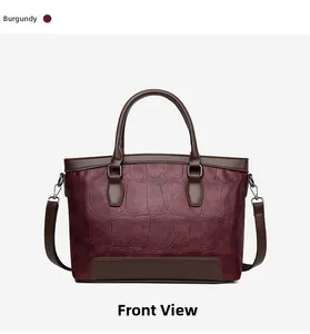 Front view of a wine red crocodile-embossed leather tote bag with stylish top handles