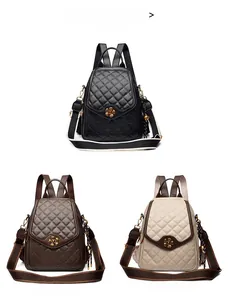 Three elegant quilted leather backpacks in black, brown, and khaki with flower buckle