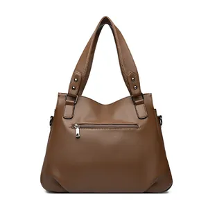 Classic dark brown leather tote bag for women with back zipper pocket and metal hardware
