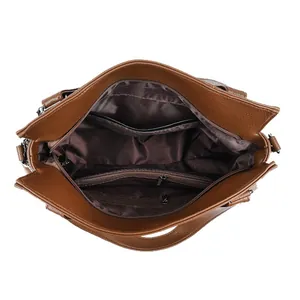 Caramel brown pebbled leather tote bag with multi-compartment interior and metal zipper