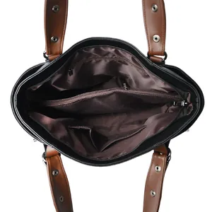 Black leather satchel featuring a spacious interior with multiple organizational compartments