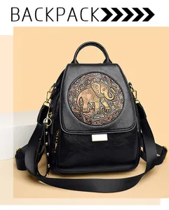Vista frontal mochila de cuero vintage negra con relieve de elefante bronce y remaches