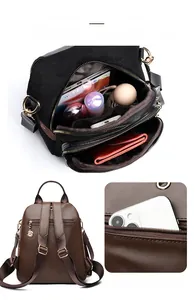 Detailed interior storage and anti-theft back pocket of the faux suede backpack