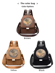 Three-color display of suede backpacks in brown, yellow, and black with deer embossing