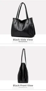Detail of black pebbled leather tote bag with silver M-shaped metal buckle accents
