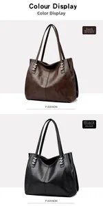 Detail view of dark brown and black leather tote bags with silver metal buckle