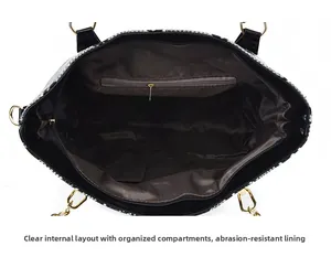 Detailed interior of snakeskin pattern tote bag showing zip pocket and lining