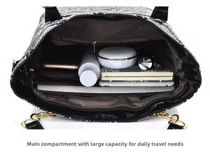 Spacious main compartment of snakeskin pattern tote bag showing daily essentials storage