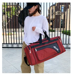 Close-up of burgundy quilted fitness bag showing large capacity and side shoe compartment