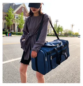 Blue quilted travel bag with Sporty print and adjustable shoulder strap for gym