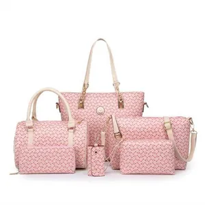 Pink 6-piece tote bag set with arrow monogram print and gold-tone metal hardware