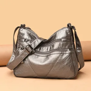 Vintage dark silver washed leather crossbody bag with multiple zipper pockets