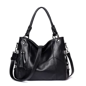 Borsa tote in pelle nera classica con dettaglio frange e accessori in metallo argento