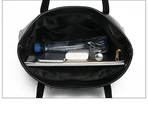 Interior view of black stone pattern tote bag showing large capacity and internal pockets