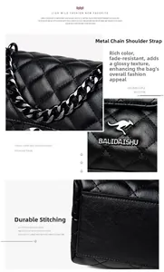 Detail of quilted sheepskin texture and metallic chain strap on a black crossbody bag