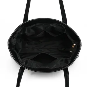 Spacious black tote bag with stone pattern texture and organized internal compartments