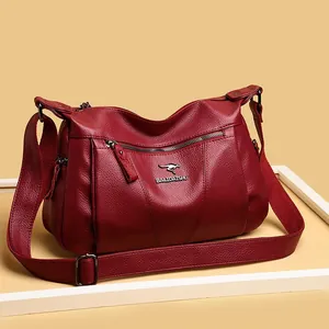 Classic dark red lychee pattern leather crossbody bag with kangaroo logo detail