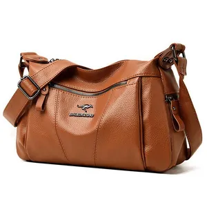 Brown litchi pattern shoulder bag with metal kangaroo logo and adjustable strap