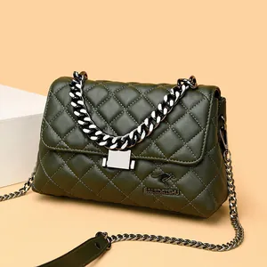 Classic dark green sheepskin quilted crossbody bag with stylish silver chain strap