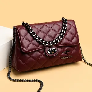 Classic burgundy quilted crossbody bag with metallic chain strap and turn-lock closure