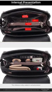 Macro view of multi-compartment interior for black leather tote with organized pockets