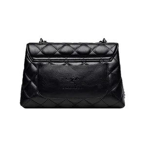 Black quilted sheepskin crossbody bag with diamond pattern and metal chain strap