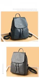 Detail showing soft blue and grey faux leather backpacks with fringe and metal chain