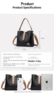 Detail view of leather bucket bag showing 22x20x10cm size and gold kangaroo logo