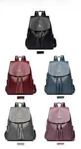 Collection of soft leather backpacks in five colors with tassel detail and kangaroo logo