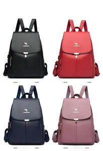 Lot de quatre sacs à dos en cuir PU texturé en noir, rouge, bleu et violet
