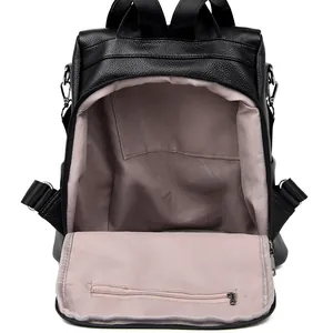 Black litchi grain leather backpack for women with spacious multi-pocket interior