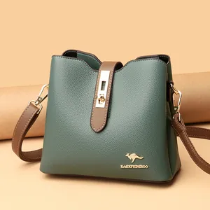 Sage green contrast kangaroo bucket bag in textured leather with golden hardware