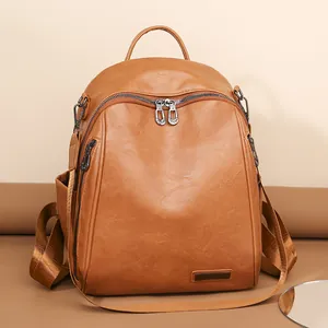 Mochila vintage de cuero sintético marrón con correas ajustables para escuela y viajes