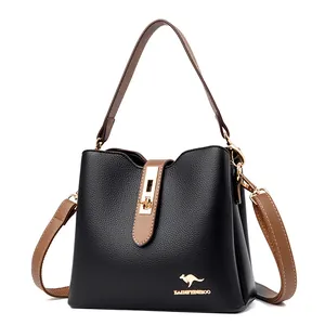 Contrast leather kangaroo bucket bag with gold lock and two-tone shoulder strap design