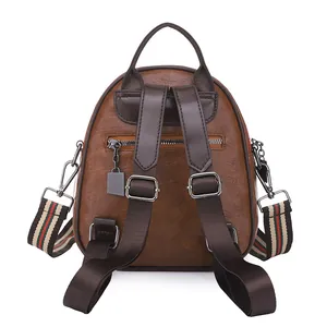 Brauner Muschel-Rucksack aus Kunstleder mit Streifenriemen und Diebstahlschutz