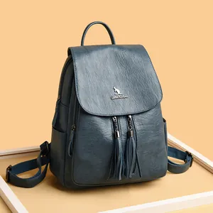 Deep blue-grey textured leather backpack for women with kangaroo logo and tassel details