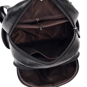 Black leather backpack with large capacity and multi-layer internal storage compartments