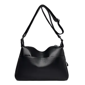 Borsa a tracolla classica da donna nera con trama litchi e tracolla regolabile