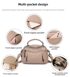 Detail view showing multi-pocket storage and large capacity layout of the boston bag