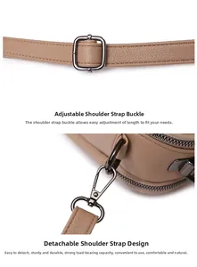 Detail of adjustable strap and gunmetal hardware on lychee textured leather bag