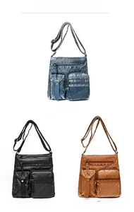 Detailed view of casual bucket bags in blue, black, and brown vintage washed PU leather