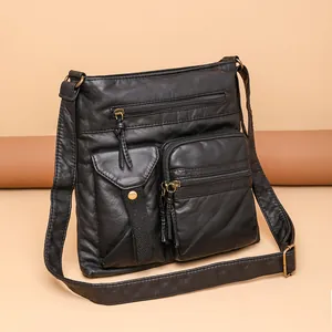 Black PU leather bucket bag with multi-pocket design and adjustable shoulder strap