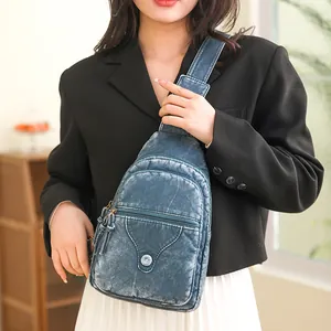 Women's vintage blue-grey soft leather chest bag with double zippers and washed texture