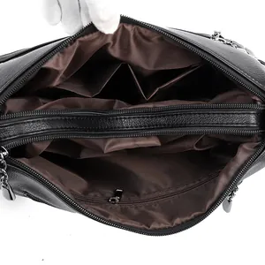 Damenhandtasche aus Leder mit strukturierter Oberfläche und praktischer Innenaufteilung