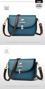 Detail view of blue lychee texture leather crossbody bag with golden kangaroo logo