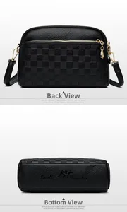 Detail view of the black leather bag showing the checkered pattern and bottom base