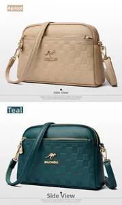 Detail view of lychee texture leather cross-body bags with checkered embossing patterns