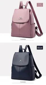 Close-up of soft leather backpacks in taro purple and blue with kangaroo metal logo